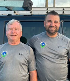 Father and son dryer vent cleaning team